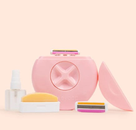 Pink razor travel case with spray bottle and replacement blades