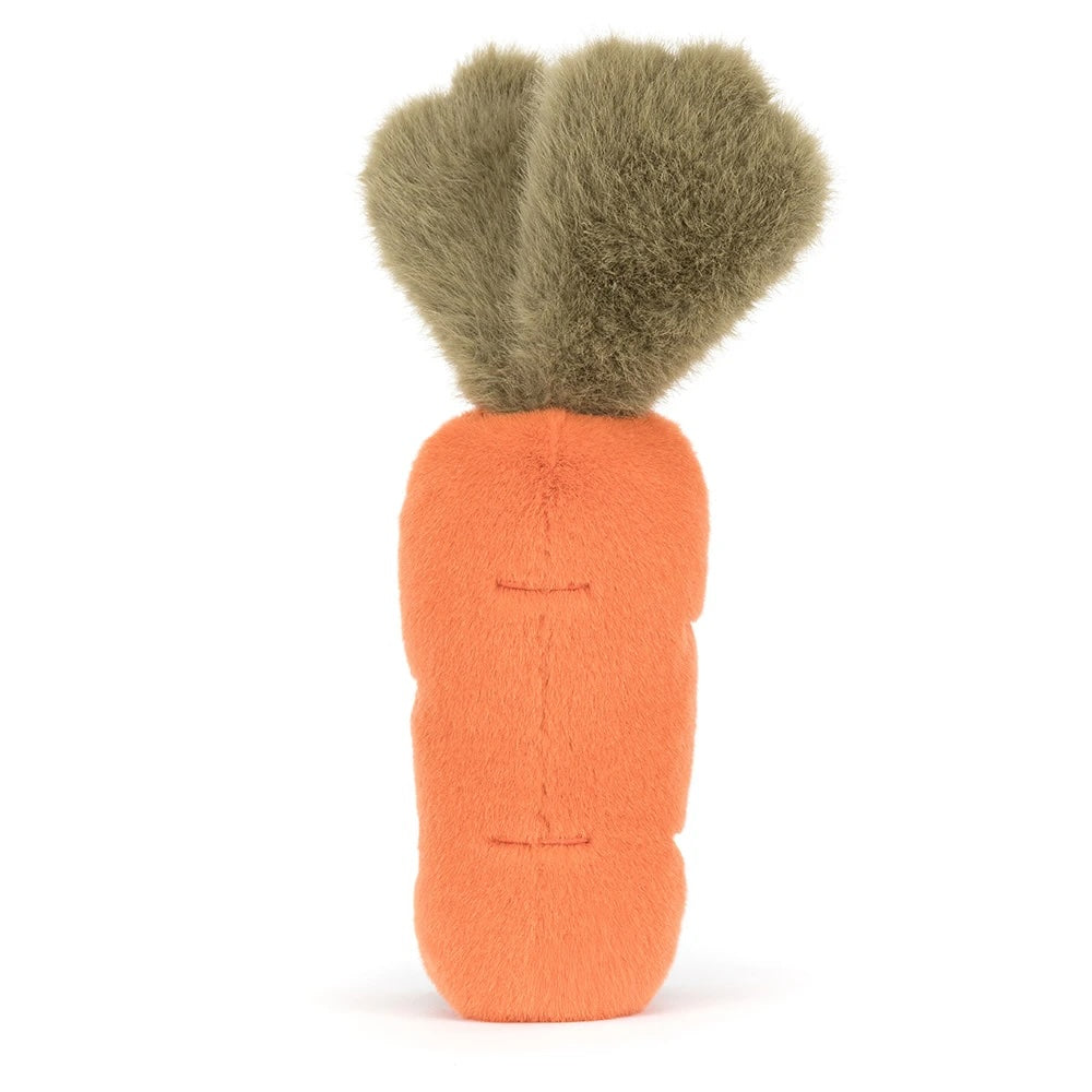 A vibrant orange plush carrot toy with soft fuzzy olive green leaves and stitched horizontal indentations on its body