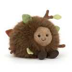 Round brown plush toy with a fuzzy texture and small fabric leaves and twigs attached