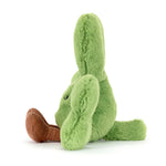 Fluffy green plush toy rabbit with long ears and distinct brown corduroy feet sits facing left on a pure white background a small black eye visible
