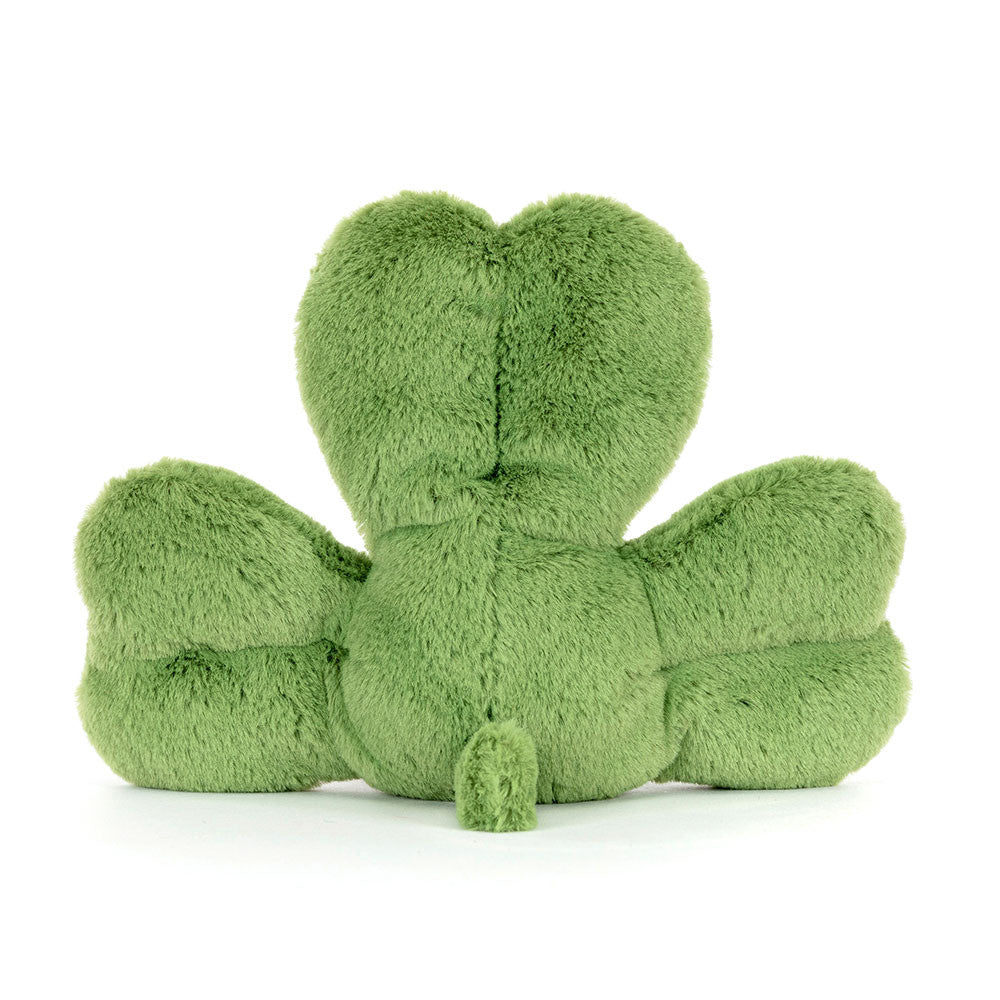 Photograph of a vibrant lime green plush frog toy seen from the back on a white background showcasing its heart-shaped head, soft fuzzy texture, and small tail