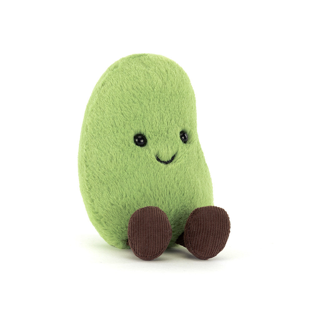Plush toy by Jellycat of a fuzzy lime green bean sitting on a white background with a small stitched smile and dark brown corduroy feet