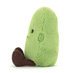 Green plush toy shaped like a pear with brown corduroy feet