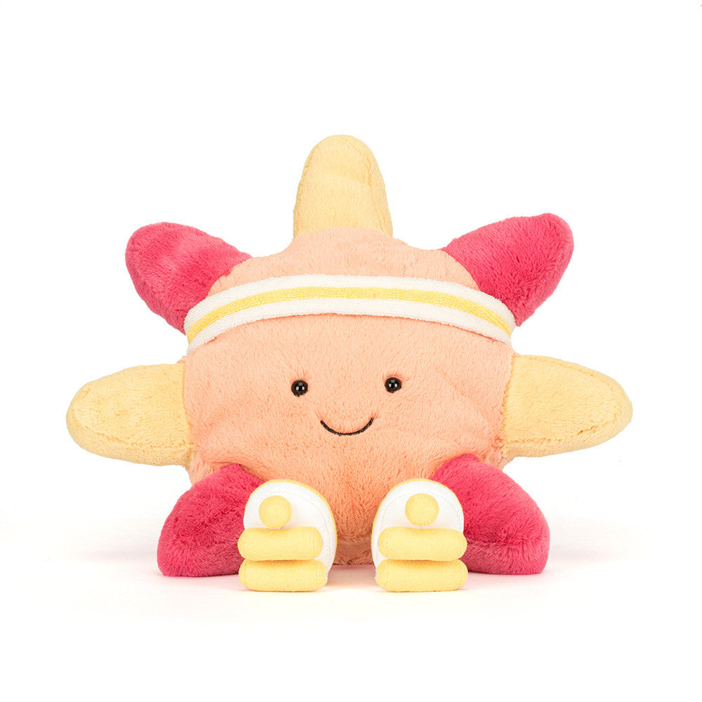 Plush starfish toy wearing a yellow and white headband and white sneakers
