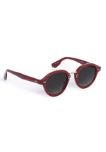 Product photograph of dark red round sunglasses with dark grey tinted lenses, silver hinge details, and small stud accents on the temples and front, displaying model numbers 47023 and 42129 on the arms against a clean white background