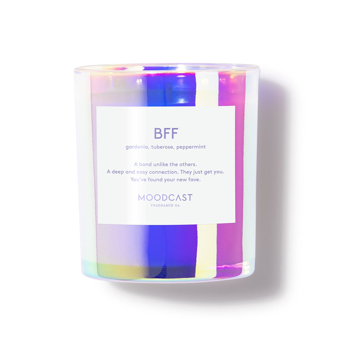 Iridescent glass candle jar with a white label reading BFF gardenia tuberose peppermint Moodcast Fragrance Co