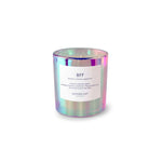 Iridescent glass candle jar with a white label reading BFF gardenia tuberose peppermint