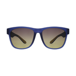 Product shot of contemporary sunglasses with matte royal blue frames and gradient lenses fading from brown to amber-yellow and dark temples