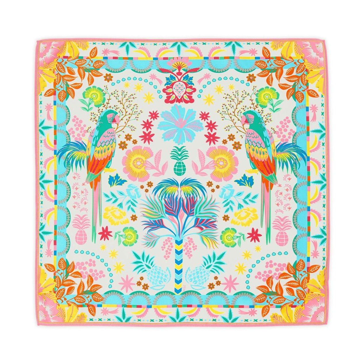 Textile design showcasing a symmetrical vibrant tropical pattern featuring two facing macaws, a central stylized palm tree, abundant pink and yellow flowers, and blue-green pineapples within a dynamic scalloped and geometric border