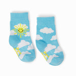 A pair of knitted textile baby socks, light blue with white clouds, one sock featuring a prominent smiling yellow sun, and yellow Boyofok branding on the sole