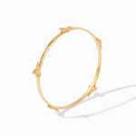 Gold bangle bracelet featuring small bee accents