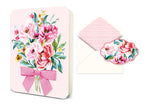 Greeting card with watercolor floral bouquet and pink ribbon next to an envelope with striped liner