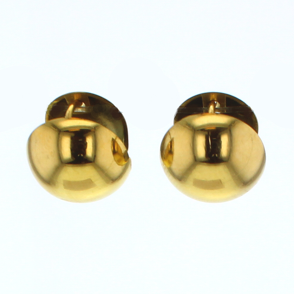 Jewelry: a pair of polished yellow gold domed stud earrings with brilliant reflective surfaces