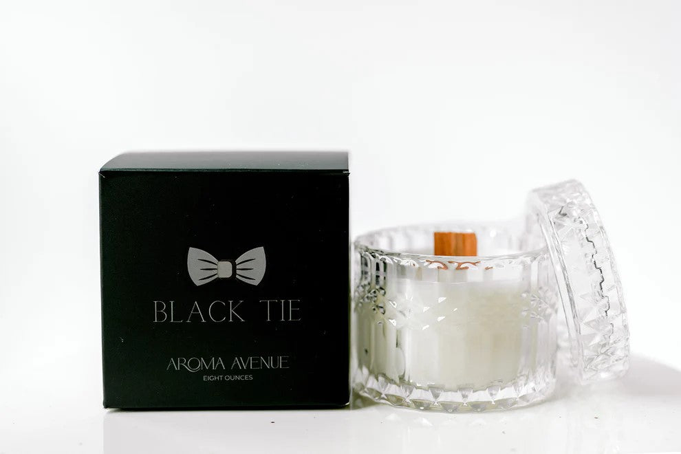 Black Tie Aroma Avenue candle in a crystal jar with a black box