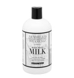 Archipelago Botanicals Milk body wash in a white bottle with a black cap