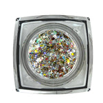 Photograph of a clear square pot brimming with vibrant iridescent glitter featuring a dazzling mix of silver, gold, and multicolored specks and tiny stars