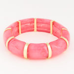 Jewelry a vibrant pink marbled resin bangle with gold-toned segmented links