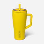 BRÜMATE product photo of a bright yellow insulated travel mug featuring an integrated handle, a straw lid with a brown accent ring, and the BRÜMATE logo on a plain white background