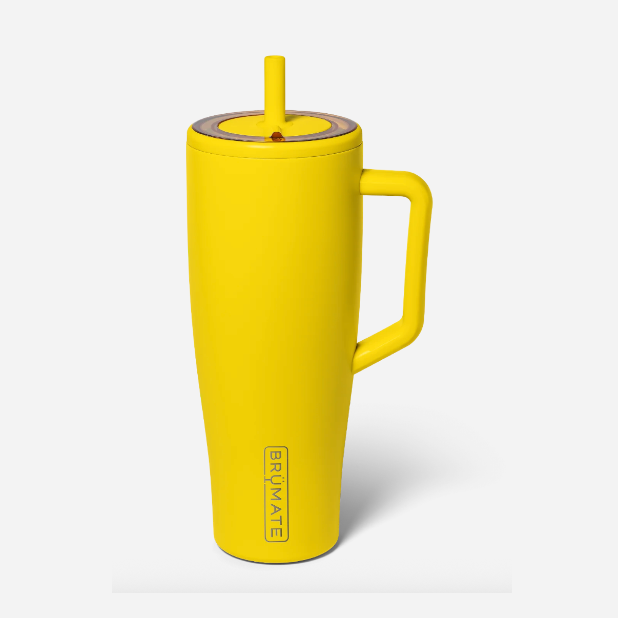 BrüMate product photograph showcasing a vibrant yellow Era 40oz insulated tumbler with a wide handle, integrated straw, and a clear leakproof lid accented with a brown ring on a clean white background