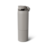 Product photo of a matte grey Brümate water bottle with a flip-top lid featuring a U-shaped locking button and clear plastic carry loop