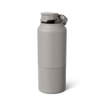Muted grey BrüMate ReHydration bottle featuring a straw lid, integrated carry handle, and vertically embossed BRÜMATE logo