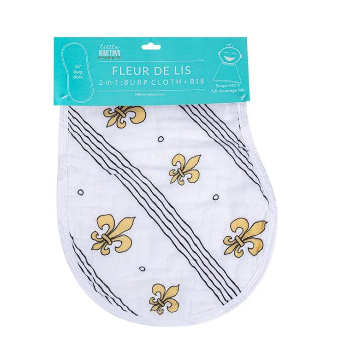 Little Hometown 2-in-1 burp cloth and bib featuring a white fabric with bold gold Fleur de Lis symbols and thin black diagonal stripes, evoking iconic New Orleans culture