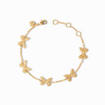 Gold chain bracelet featuring five small butterfly charms