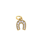 A sparkling gold horseshoe pendant featuring eight brilliant round diamonds pave-set in a textured yellow gold surface with a smooth bail