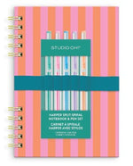 Pink and orange striped spiral notebook with a set of five gel pens held by a teal elastic band