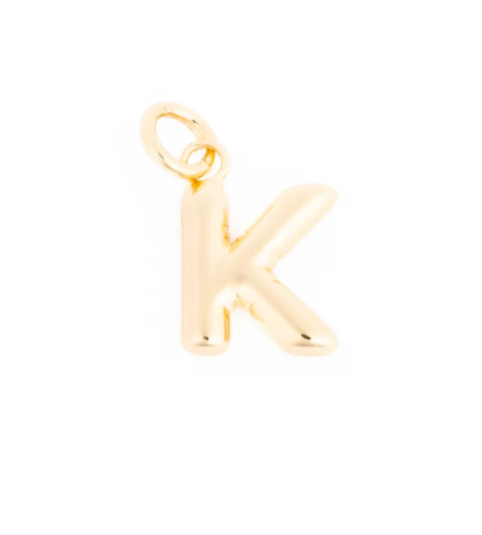 Gold initial K pendant with a smooth reflective surface and integrated bail