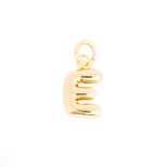 Gold charm of a shiny puffy lowercase letter E with a small jump ring