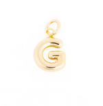 Gold G letter pendant with a shiny reflective surface and a rounded puffy design featuring a small bail loop at the top
