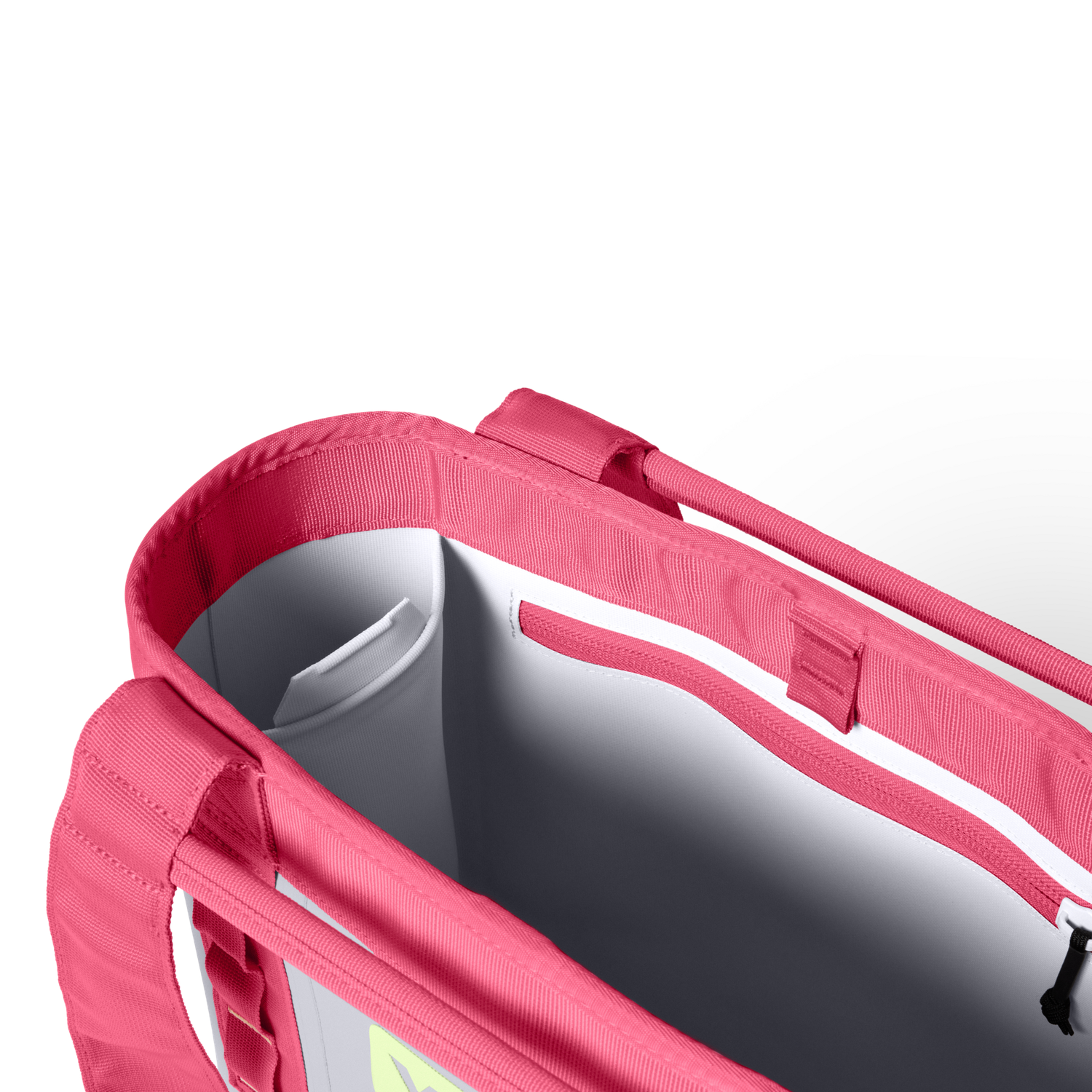 Interior view of an open pink tote bag with white lining and side pocket