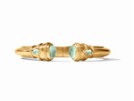 Gold cuff bracelet with two large faceted mint green stones and two smaller teardrop mint green stones