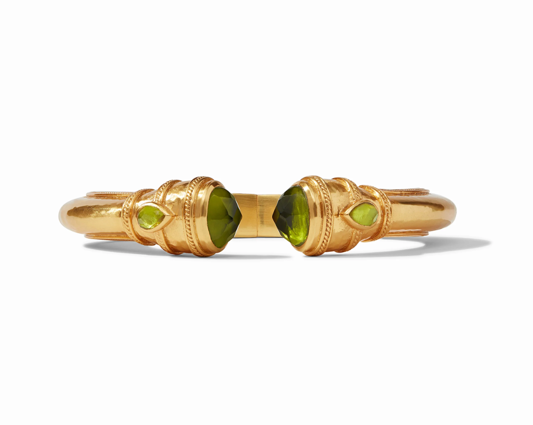 Gold cuff bracelet with green peridot stones