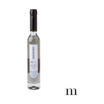 Product photograph of Mixture's Hypoallergenic Bubble Bath in a clear glass bottle with black cap, translucent grey liquid, and a white label detailing 'CASHMERE' scent with a silver 27 seal on a plain white background