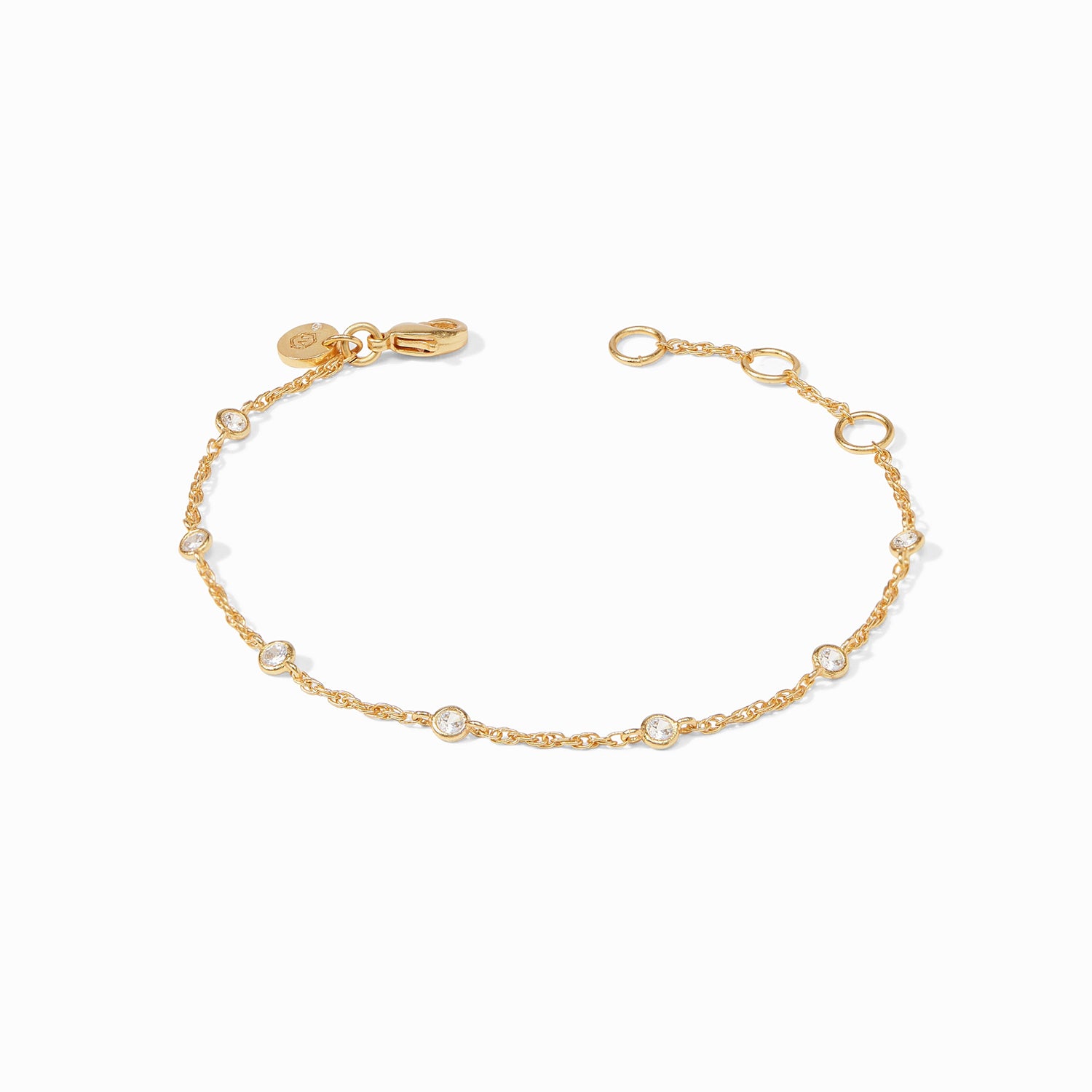 Gold chain bracelet with evenly spaced round clear stones and a lobster clasp