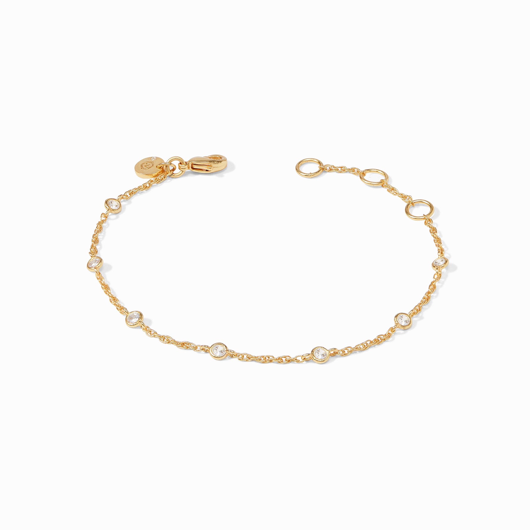 Gold chain bracelet with evenly spaced round clear stones and a lobster clasp