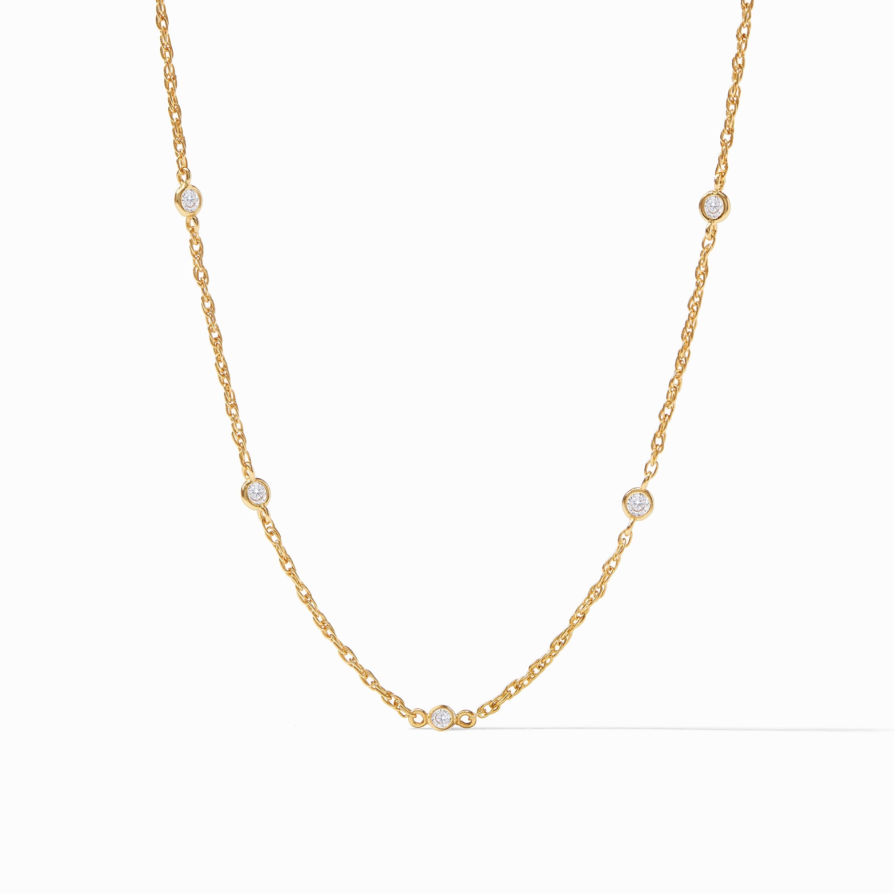 Gold chain necklace with five bezel set round diamonds