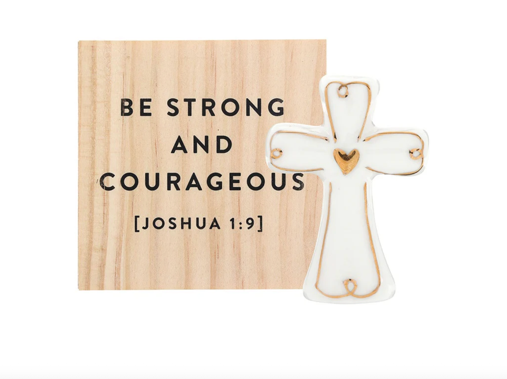 Wooden plaque with Joshua 1 9 text next to a white ceramic cross with gold heart detail