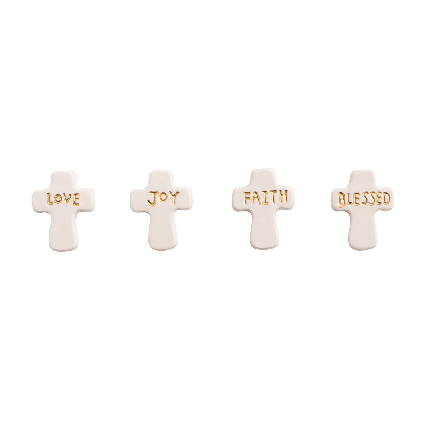Four cream-colored ceramic cross-shaped tiles arranged in a row featuring embossed gold words LOVE JOY FAITH BLESSED