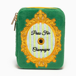 Green velvet zippered pouch with embroidered gold frame and Press For Champagne text
