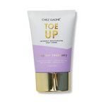 Beauty product packaging showing Chez Gagné Toe Up Intensely Moisturizing Foot Crème in a white and lavender tube with a reflective gold base, featuring bold gold 'TOE UP' text and 'Lavender Rosemary' scent made with shea cocoa butter and jojoba