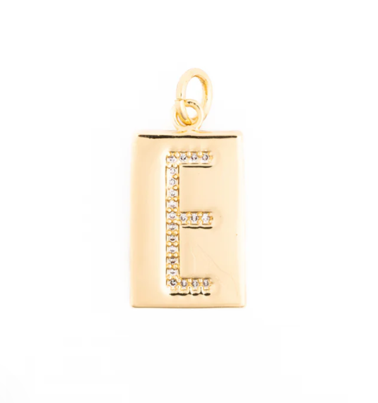 Gold-plated rectangular jewelry pendant featuring a capital letter E pave-set with sparkling clear crystals, a polished finish, and a small top loop bail on a white background
