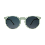 Pale green round-framed sunglasses with dark lenses on a clean white background