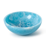 Marbled blue and white resin bowl featuring a glossy finish and a smooth rounded shape against a white studio background