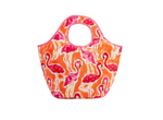 Fabric tote bag featuring a vibrant pink flamingo pattern over an abstract orange and white background with distinctive circular handle cutouts and pink trim
