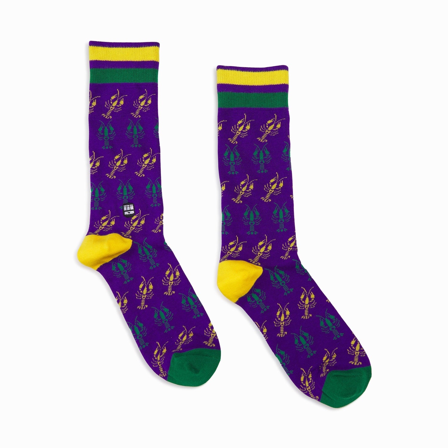Purple socks with green and yellow crawfish accents on a white background