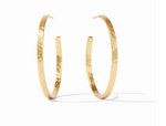 Pair of gold hoop earrings with a hammered texture