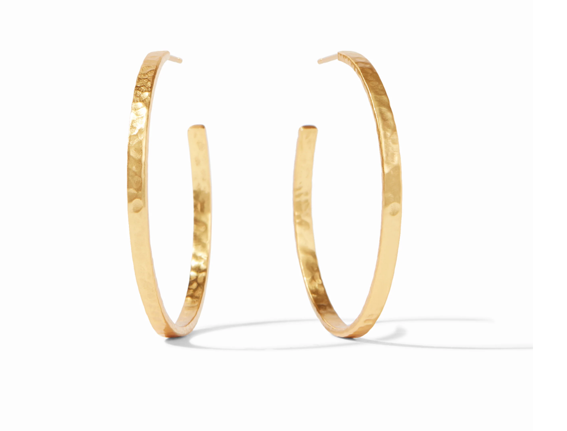 Pair of gold hoop earrings with a hammered texture
